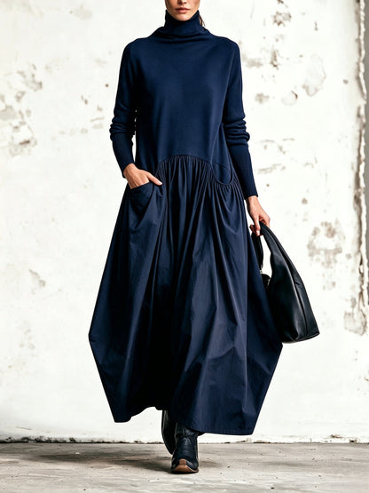 Vestido maxi oversize con cuello alto y detalle de bolsillo