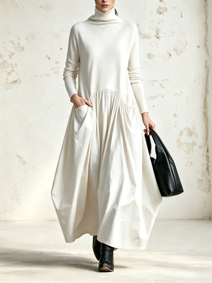 Vestido maxi oversize con cuello alto y detalle de bolsillo