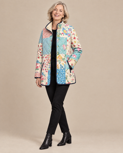 Woman posing in the Zarae charming floral quilted jacket