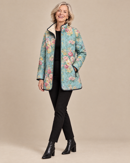 Woman posing in the Elara quilted floral print jacket