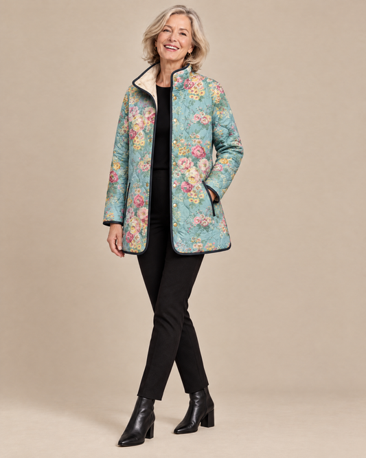 Woman posing in the Elara quilted floral print jacket