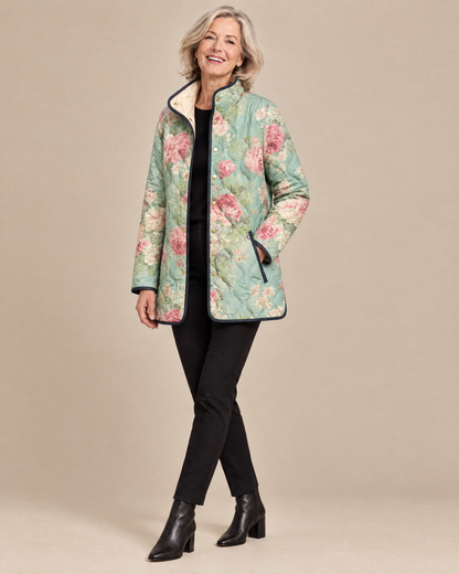 Woman posing in the Nola floral printed quilted jacket
