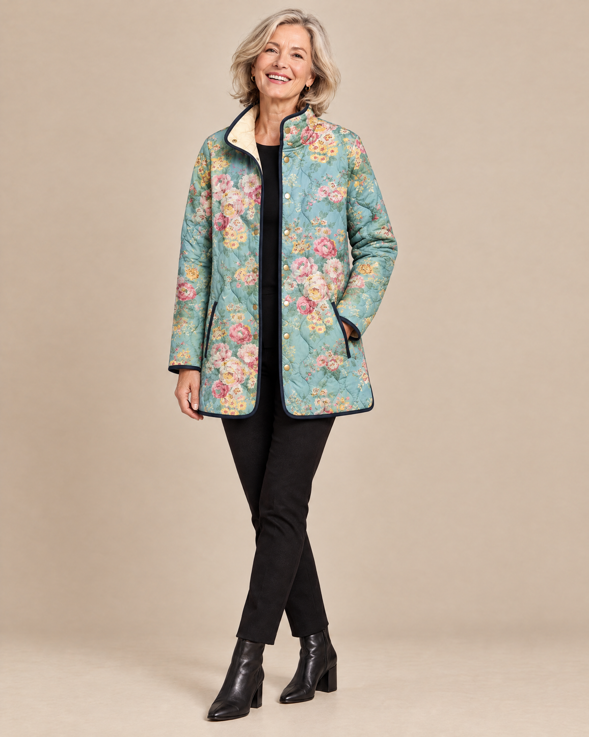 Woman wearing the Elara quilted floral print jacket, front view