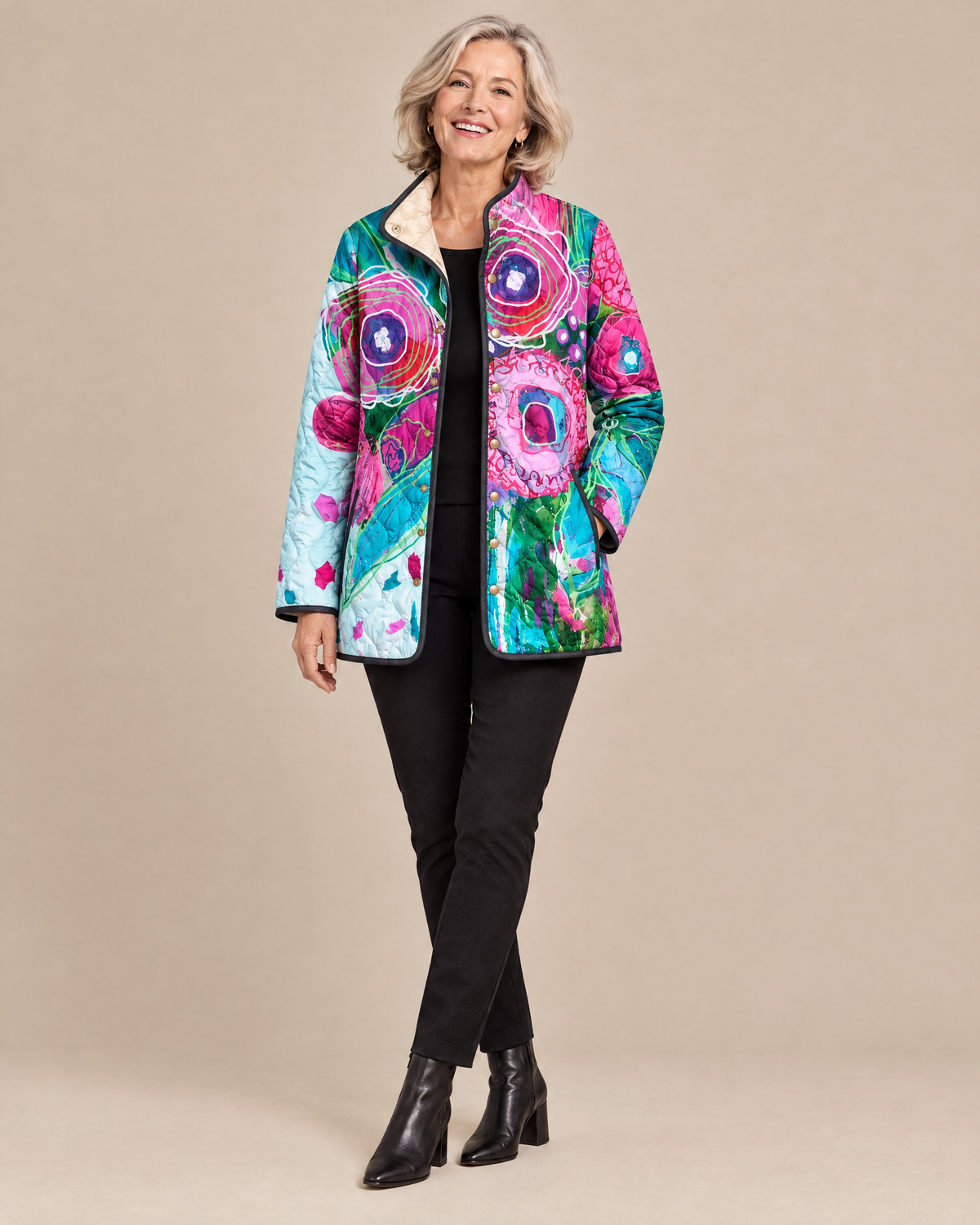 Woman wearing the Isabella elegant floral pattern quilted jacket, front view