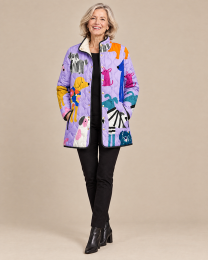 Woman wearing the Rhea casual quilted jacket with dog print, front view
