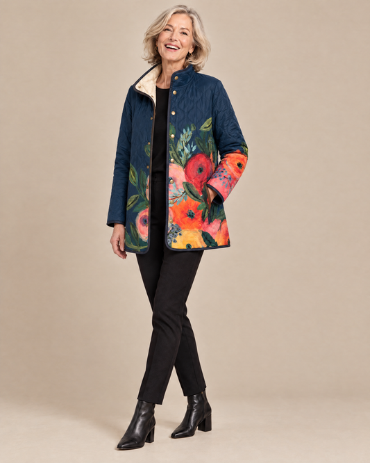 Woman posing in the Amaya vintage floral print quilted jacket