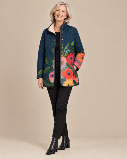 Woman wearing the Amaya vintage floral print quilted jacket, front view