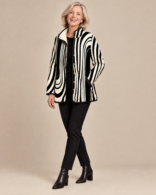 Woman posing in the Soraya abstract geometric quilted jacket