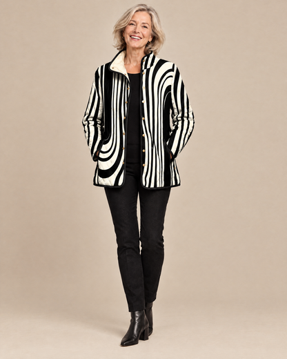 Woman wearing the Soraya abstract geometric quilted jacket, front view