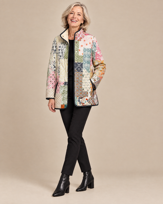 Woman posing in the Suri casual floral print quilted jacket