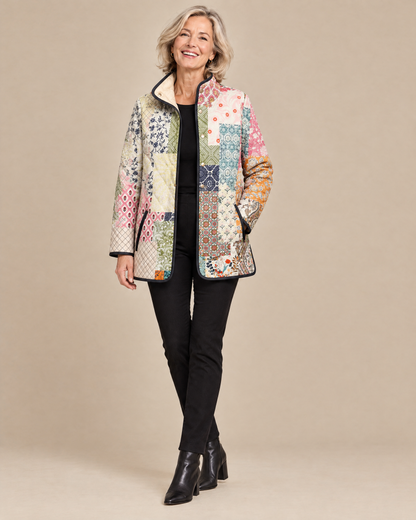 Woman wearing the Suri casual floral print quilted jacket, front view